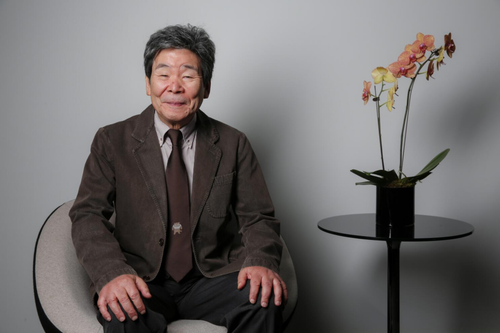 portrait of isao takahata smiling, looking at the camera